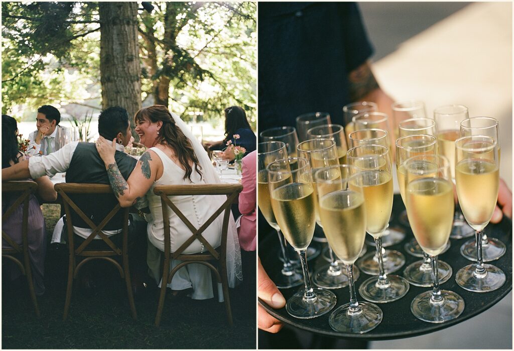 A server carries a tray of champagne through the Wayfarer Whidbey Island.