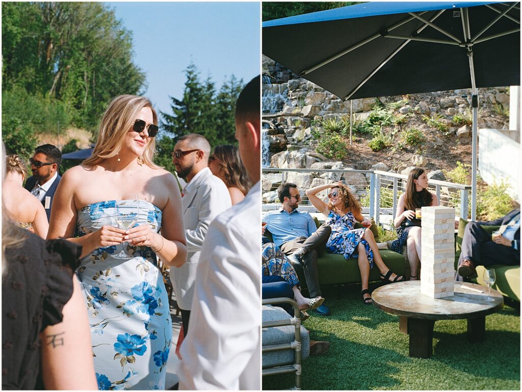 Wedding guests sip wine and talk outside at an Amaterra Winery wedding.