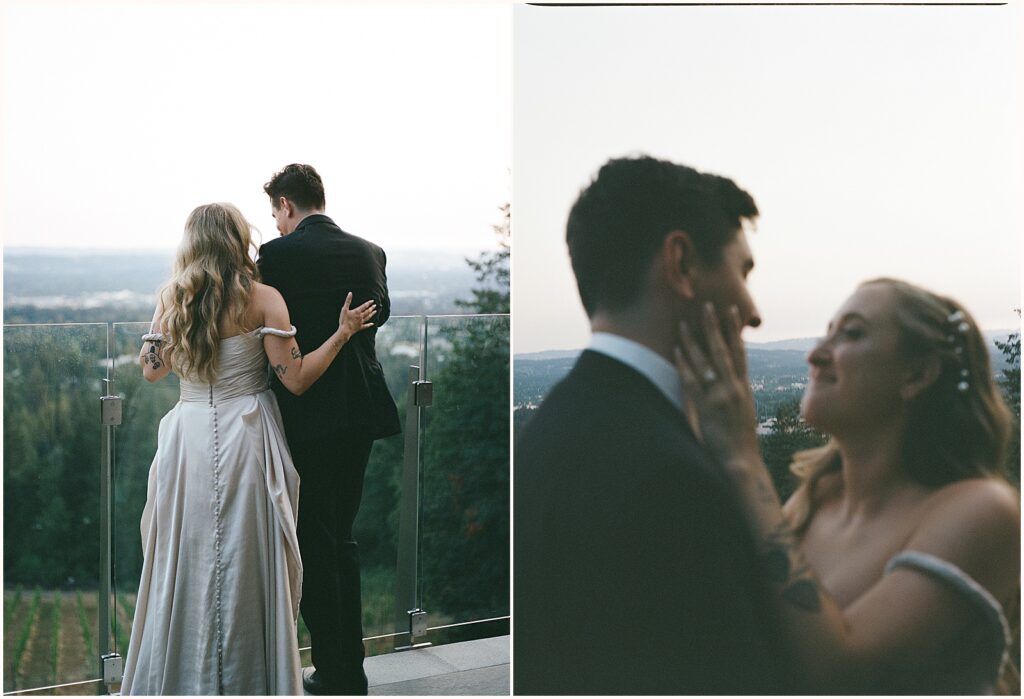 A bride and groom look out at the view from a balcony at Amaterra Winery.