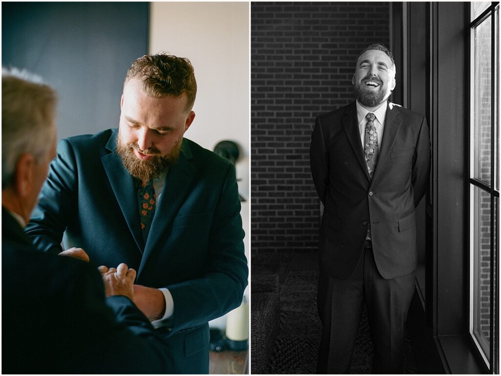 A groom poses beside a window for a portrait at Colony House Newport.