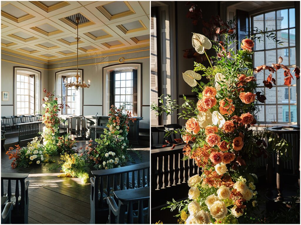 A floral installation decorates the ceremony spot at Colony House Newport.
