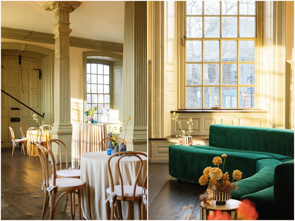 A curved green couch sits inside Colony House Newport.