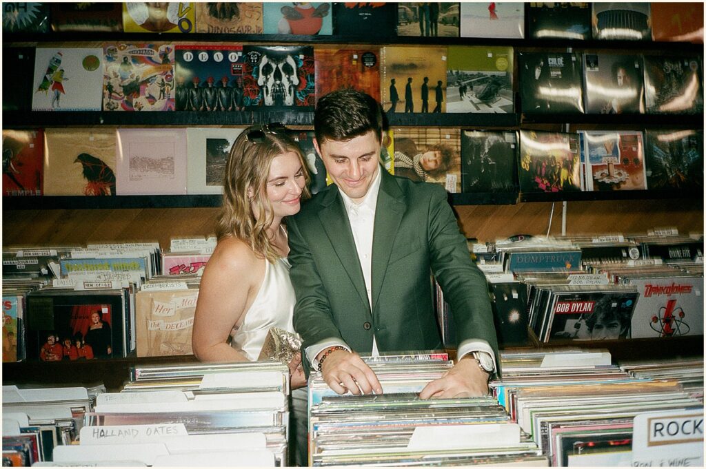 A bride and groom explore a record store before they elope in Porltand.