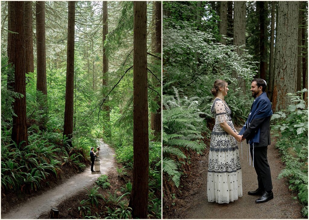 A bride and groom hold hands while they walk down a forest path at Hoyt Arboretum.