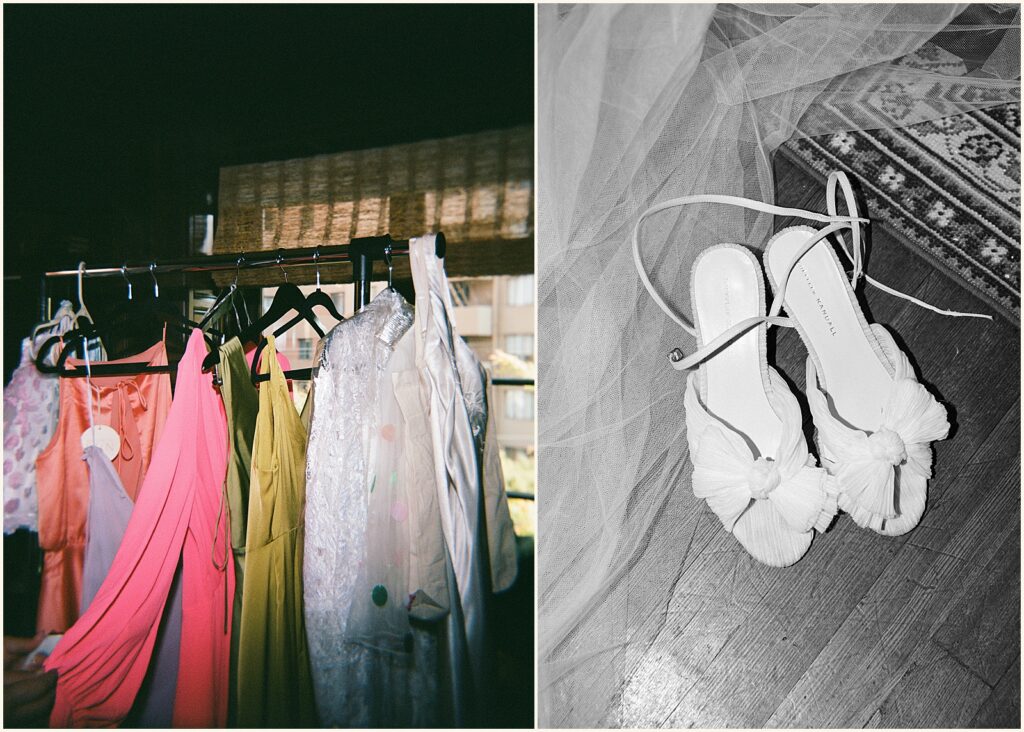 Colorful bridesmaids dresses hang on a rack.